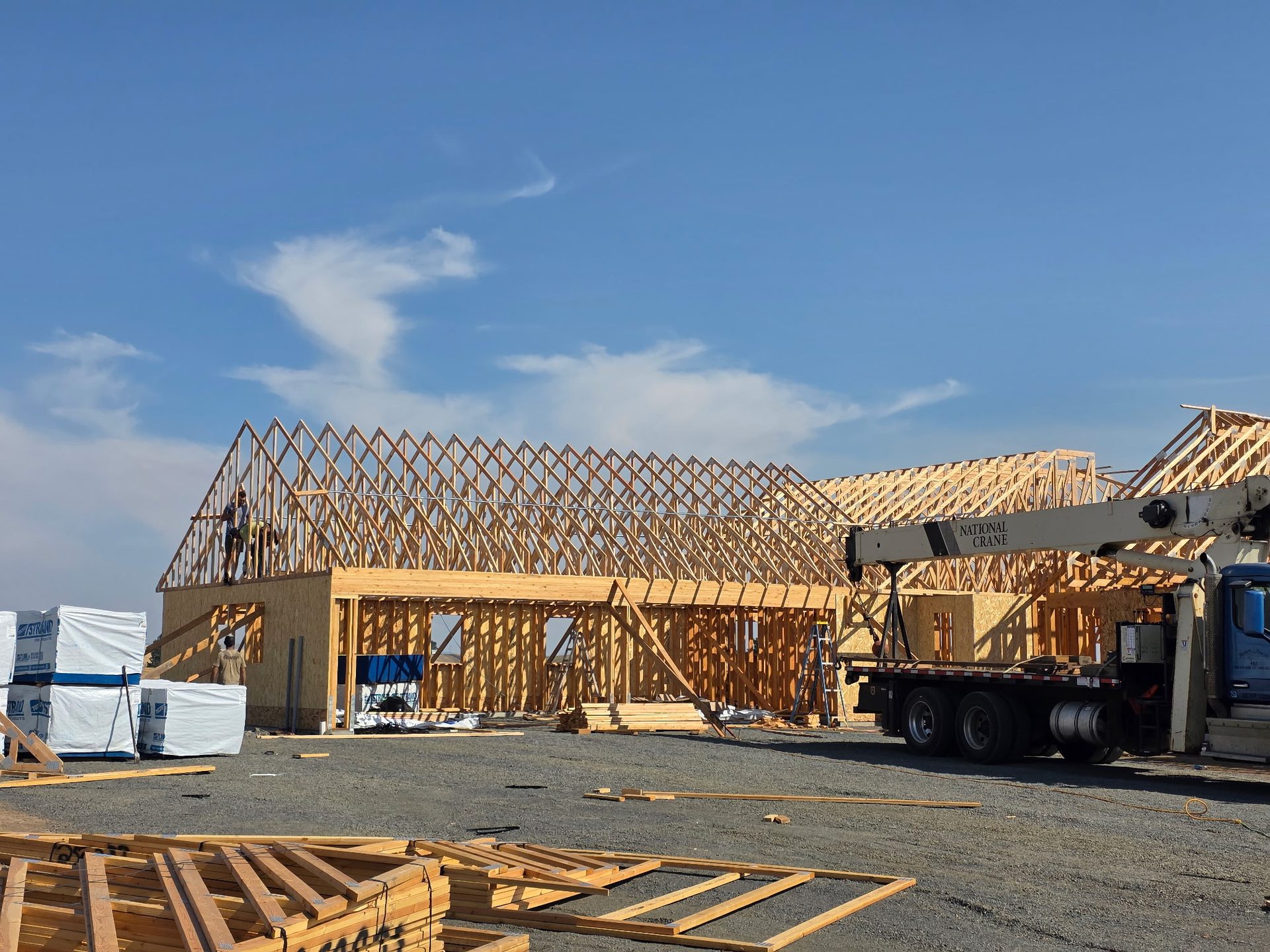 Engineered wood roof trusses on a new home under construction