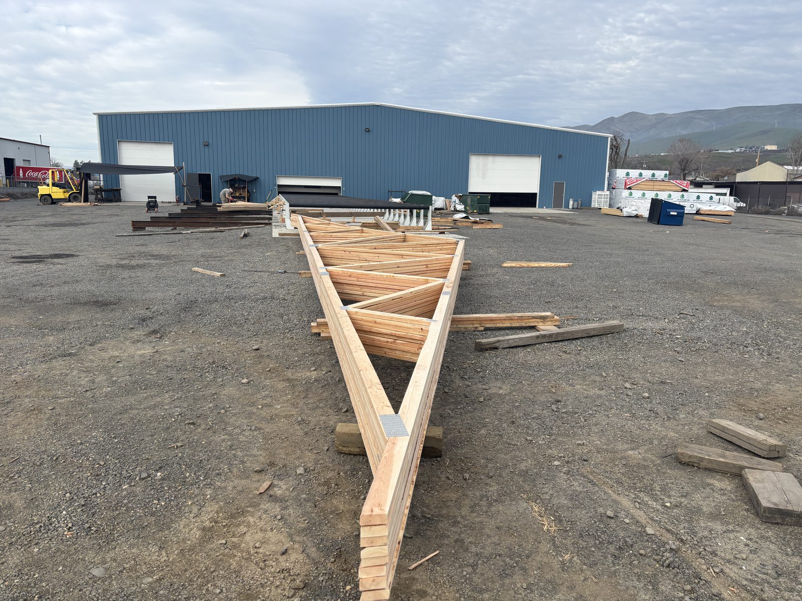 Racks of finished commercial wood trusses at the Barlow Truss plant
