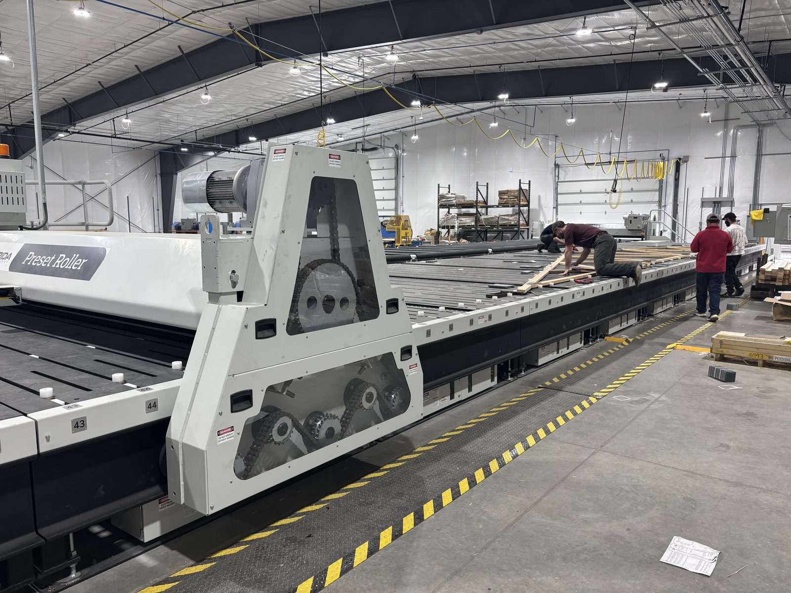 MiTek gantry table and equipment on the Barlow Truss manufacturing floor in Lewiston, Idaho